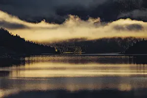 Tyrol: Sunrise with reflections in the Plansee in Tyrol in the Alps in Austria
