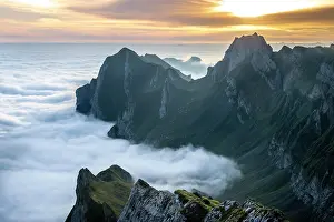 Chain: Sunrise over ridge in Alpstein, high fog in valley