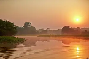 Cuiaba: Sunrise River Cuiaba Black channel Pantanal area