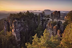 Bridge: Sunrise, rocks, mountains, forest