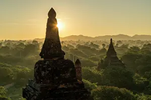 Pagodas: Sunrise over the temples and pagodas in the plain