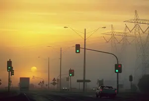 Fumes: Sunrise visible through air pollution Princes Highway