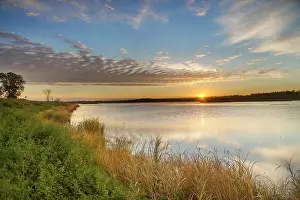 Dakota: Sunrise over wetlands at Arrowwood National