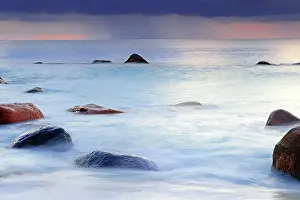 Destinations: Sunset at Anse Lazio, rain at the horizon, Praslin