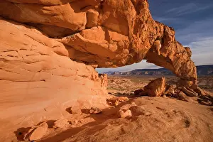Framing: Sunset Arch - beautiful rock arch framing Navajo