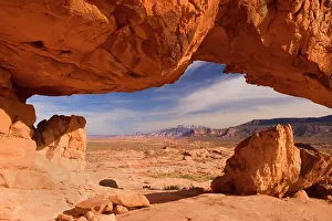 Framing: Sunset Arch - rock arch framing Navajo Mountain