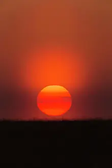 Atmosheric: Sunset - with atmosheric haze caused by dust Castro