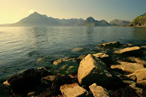 Cuillin: Sunset at beach - near Elgol with boulders in foreground
