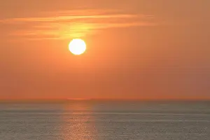 Frisian: Sunset over calm sea, Wangerooge, East Frisian Islands