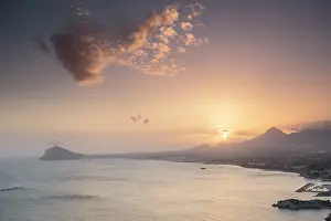 Sergio Arias: Sunset over coastal scene with Altea in background