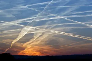 Aeroplane: Sunset with Condensation / Vapour Trails - from airliners