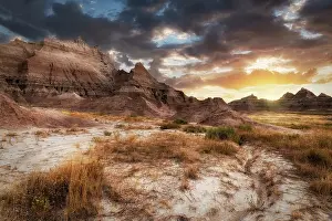 Dakota: Sunset in dramatic skies over the hoodoo peaks of