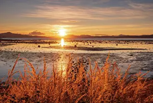 251020: Sunset over a fjord, mountain range in the back