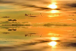 Flooded: Sunset, mountains with reflection in the lake, water