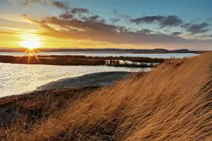 Migration: Sunset skies at Freezeout Lake Wildlife Management