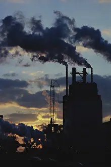 Stacks: Sunset Behind Smoke Stacks