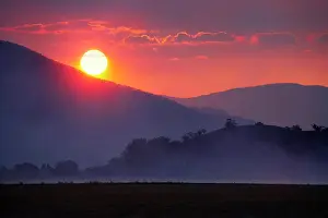 Emission: Sunset though Smokey Haze from Burnoffs