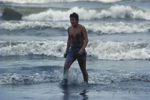 Contamination: Surfer Covered with OIl After Spill