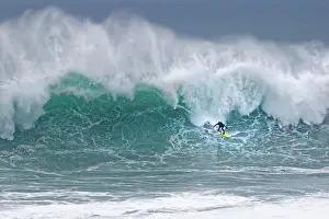 Extreme: Surfers in a wave, Nazare, Portugal, Europe
