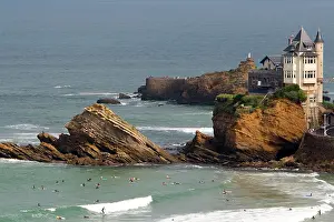Board: Surfing Cote de Basque below a castle in
