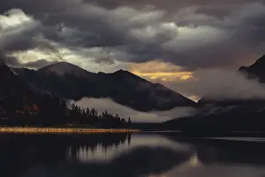 Tyrol: Surreal light atmosphere at sunrise at Plansee