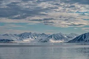 Spitsbergen: Svalbard, Norway. Landscape of mountain, water and