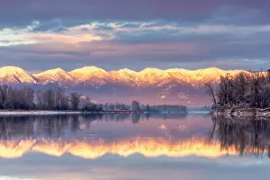 Alpenglow: Swan Mountains reflect into the Flathead