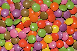 Sweets: Sweets - close-up of group of colourful circular smarties