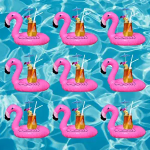 Alcoholic: Swimming pool with inflatable flamingo and cocktail