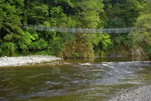 Alongside: Swing Bridge - leading over picturesque Hutt river