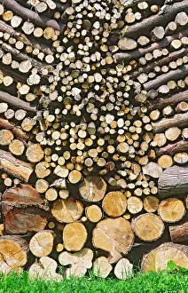 Stacked: Symmetrically stacked pile of Logs for use as firewood