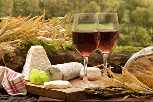 Bread: Table - with two glasses of red wine with cheese & bread