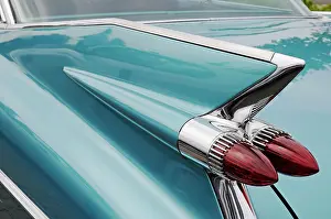 Vehicle: Tail fin, tail lights, Cadillac Coupe Series 62, A