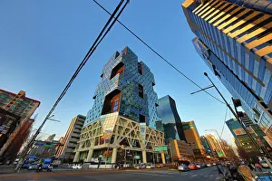 Blocks: Tall modern buildings and office blocks at dusk in the G