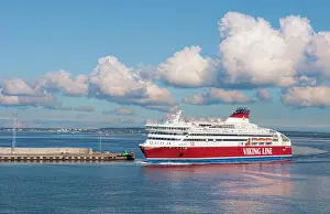Ferry: Tallinn, Estonia. White ferry arriving from