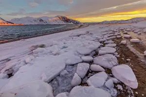 Casts: Tanafjord winter - low winter sun casts warm light over Tana