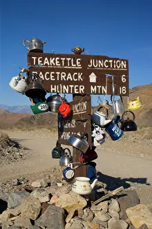 Travellers: Teakettle Junction - wooden road sign at Teakettle