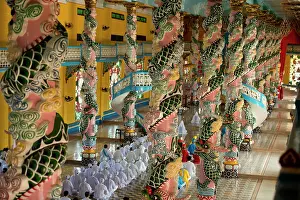 Prayer: Temple Interior with Caodaist disciples sitting