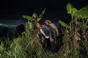 Inspecting: Thai Conservationists with Bats
