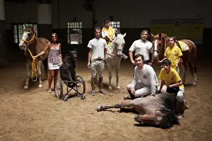 Seat: Therapists and patients in a horse therapy center