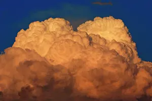 Thunder: Thunder Clouds - forming in evening light