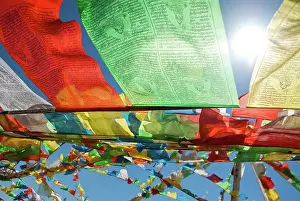 Flags: Tibet prayer flags against the sun