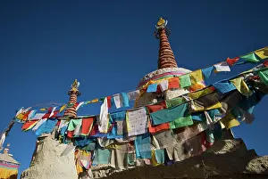 Flags: Tibet prayer flags on village stupa