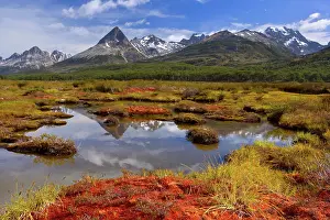 Fuego: Tierra del Fuego - mountain range reflects in a