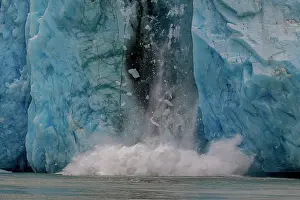 Crash: Tons of ice crash into the sea during a fall of