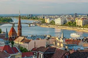 Built: Tour boat passes Hungary's Parliament, built between