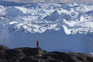 Expedition: Tourist looking at the Icefjord - Disco Bay - Greenland