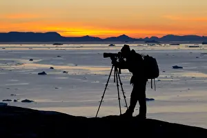 Fjords: Tourist looking at the Icefjord - Disco Bay - Greenland