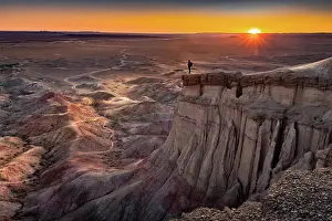Nomad: Tourist standing on rock formation Tsagaan Suvarga