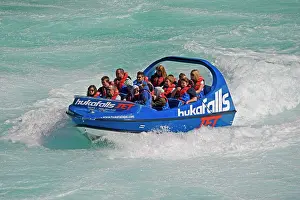Waikato: Tourists in Huka Falls jet boat Waikato River